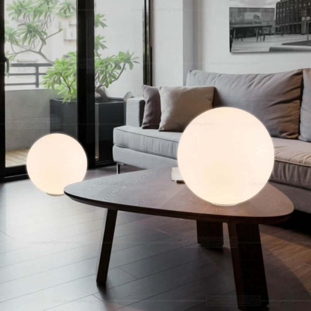 Dioscuri-Tavolo-Immagine-Diverse-Dimensioni-Ambientata-Artemide-Prisma-Light-Store-Lampade-Noci(1)