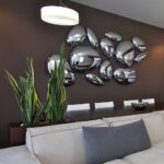 Skydro Lampada da Soffitto o Parete Modulo non Elettrificato Led Cromo Artemide Ambientata a Parete Prisma Light Store