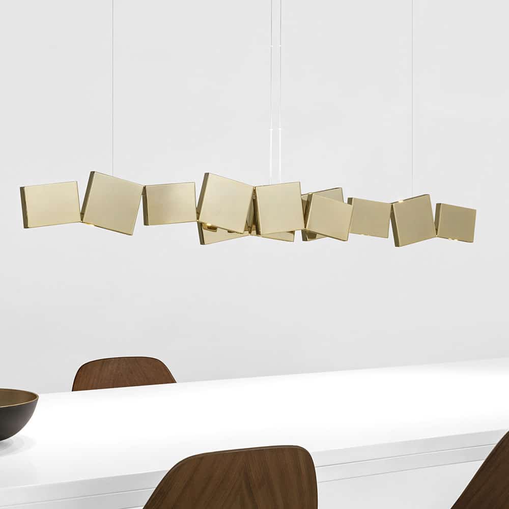 Gaia Lampada a Sospensione Led 3000K Oro Ambientata Terzani Luce Pensata Prisma Light Store Lampade